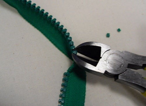 Cut the zipper 